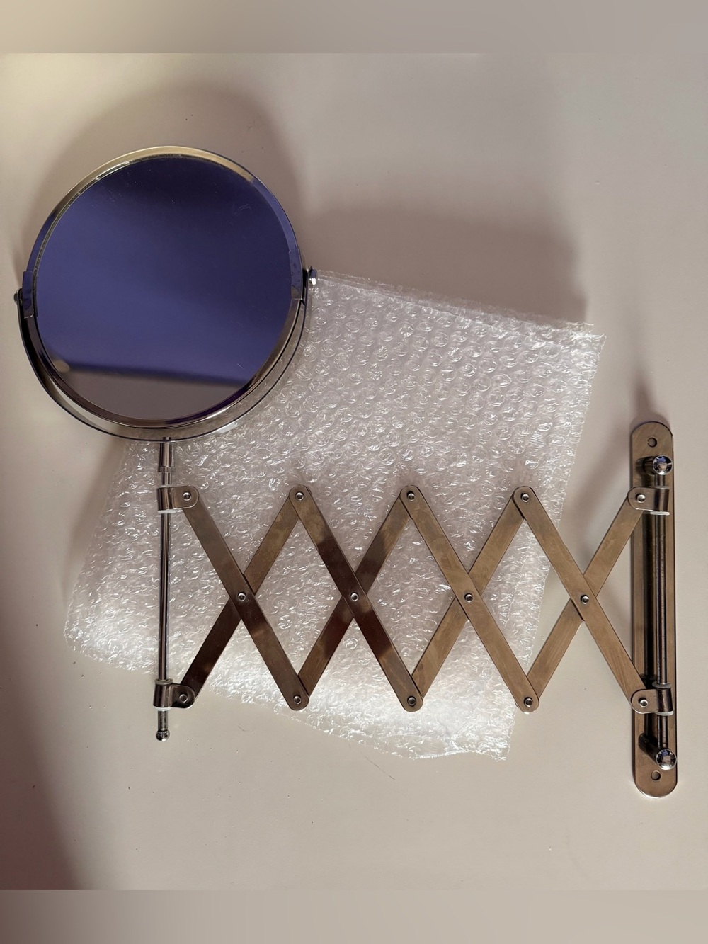 Extendable Wall-Mount Round Makeup Mirror in Silver